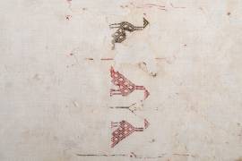 Paño de lino bordado encontrado como sudario en el relicario de Santa Susana. Taller de Asia Central, siglo XI. 